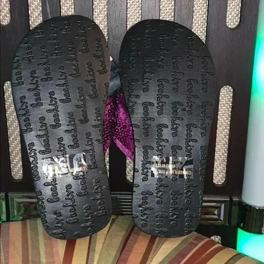 Girls black/purple Flip flops size small